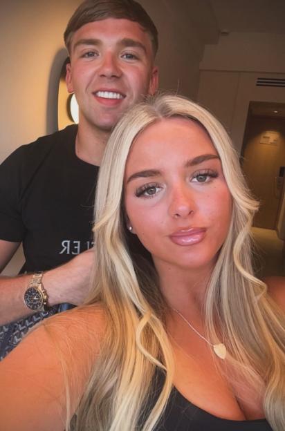 Olivia and Ethan posing together.