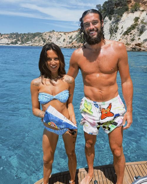 Andy Carroll and Lou Teasdale on a boat in Ibiza.