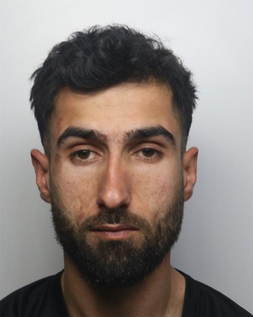 Mugshot of Mohamed Kadir, a man jailed for strangling railway staff.