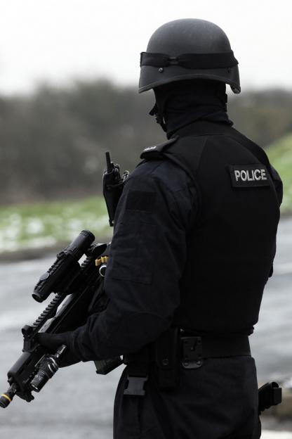 An armed police officer on a training exercise.