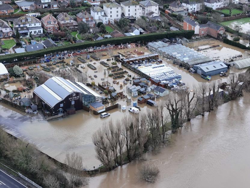 Aerial view of Groves Nurseries in Bridport, Dorset, flooded after the River Brit broke its banks during Storm Chandra.