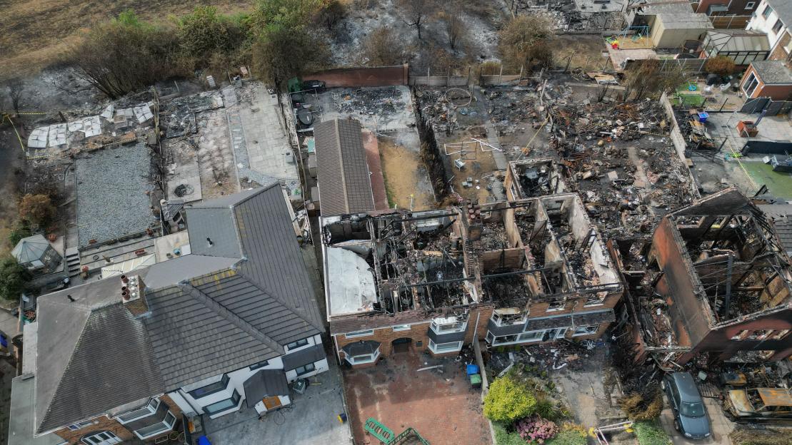 Aerial view of homes destroyed by wildfires in Stoke-on-Trent, United Kingdom.