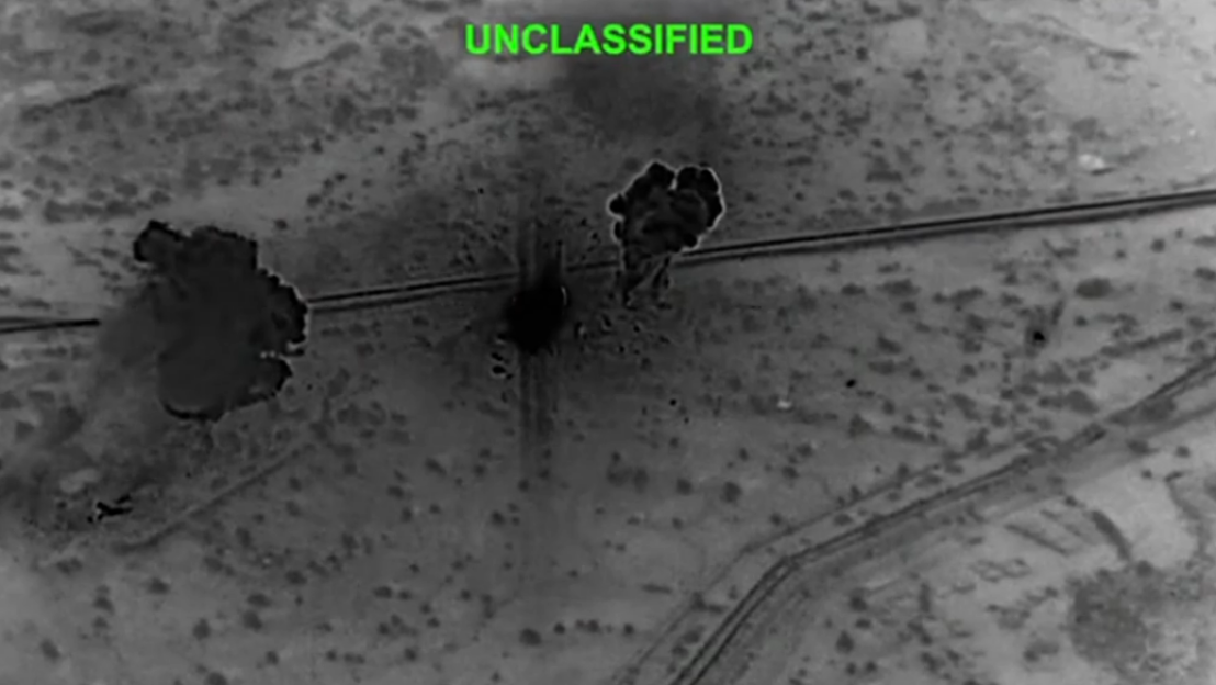Thermal image of explosions on what appears to be a pipeline.