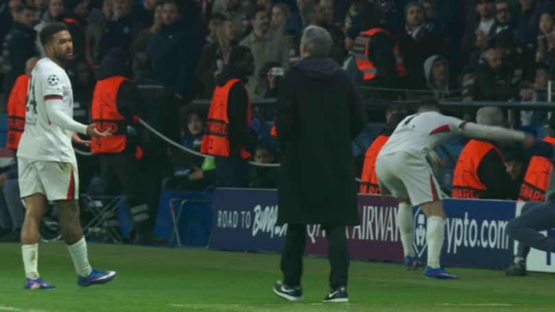 Football players on the field during a game.