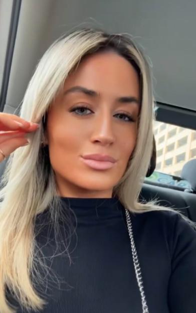 Paula Edgar looking at the camera.