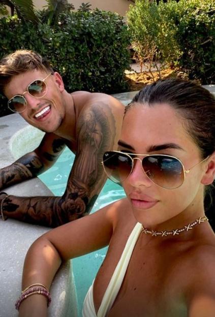 Luca Bish and Gemma Owen in a Dubai pool.