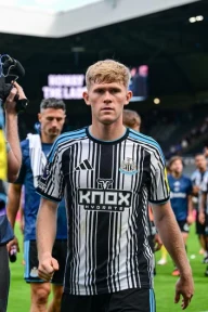 Man Utd transfer target Lewis Hall ‘absolutely delighted’ after penning bumper new Newcastle contract