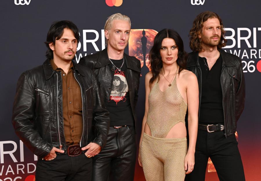 The band Wolf Alice posing on the red carpet at The BRIT Awards 2026.