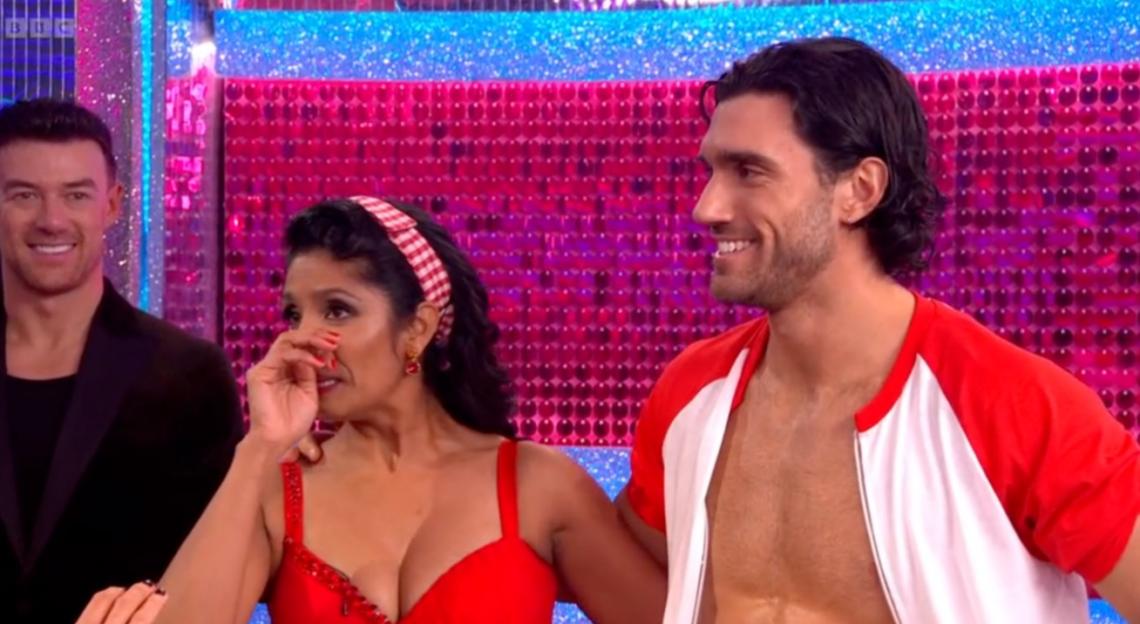 Balvinder Sopal wiping away tears after a dance performance.