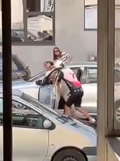 'Shocking Incident: Cyclist Pulls Female Driver from Car and Assaults Her Over Road Blockage, Sparking Police Manhunt'