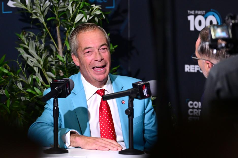 Nigel Farage speaking at the Reform UK Party Conference.