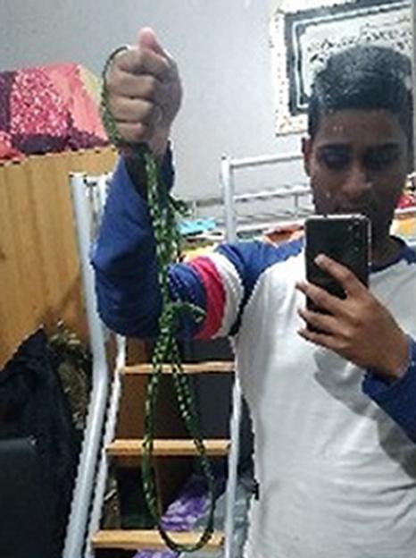 Dihan Rahman holding a rope noose in a selfie.