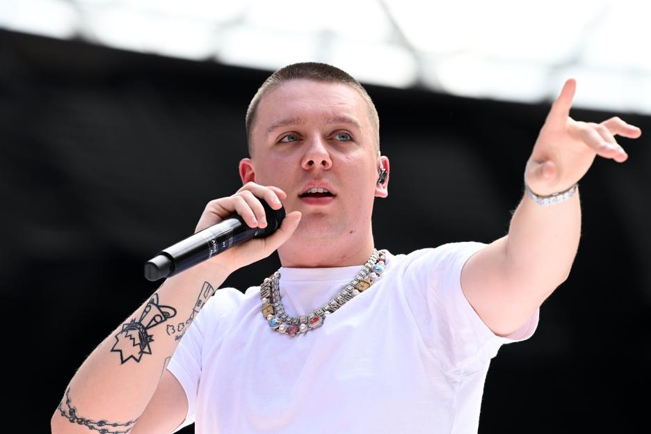 Aitch performing on stage at Capital's Summertime Ball 2024.