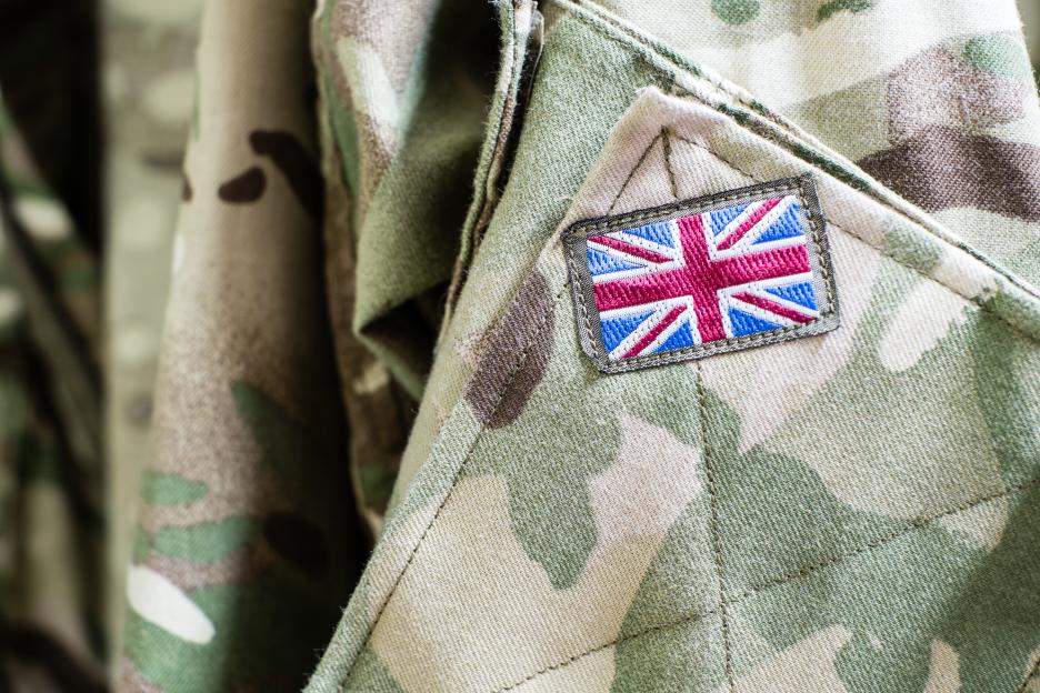 Union Jack flag on sleeve of British military camouflage uniform