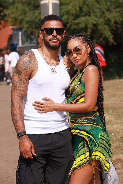 Andre Gray and Leigh-Anne Pinnock posing together at Notting Hill Carnival.