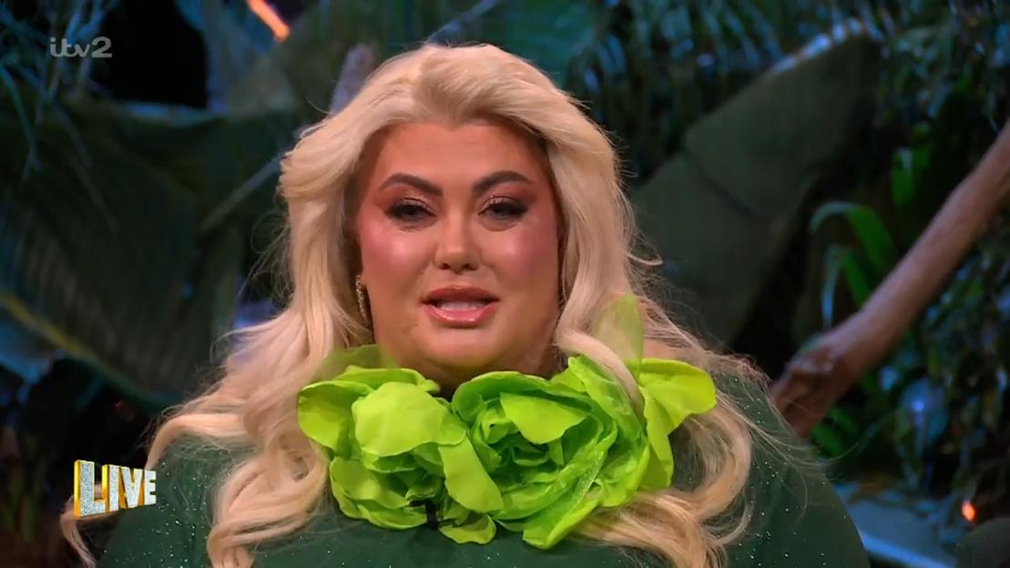 Gemma Collins speaking while wearing a bright green floral necklace.