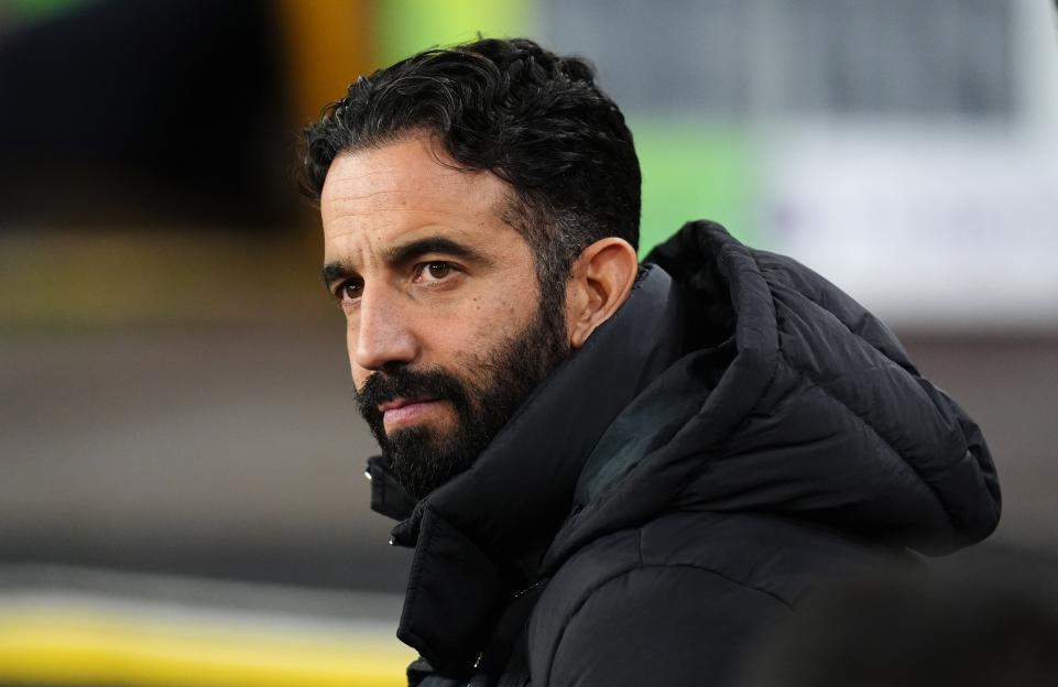 Ruben Amorim in a black puffer jacket.