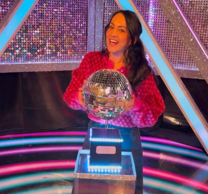 Actress Kym Marsh holds the Strictly Come Dancing Glitterball Trophy.