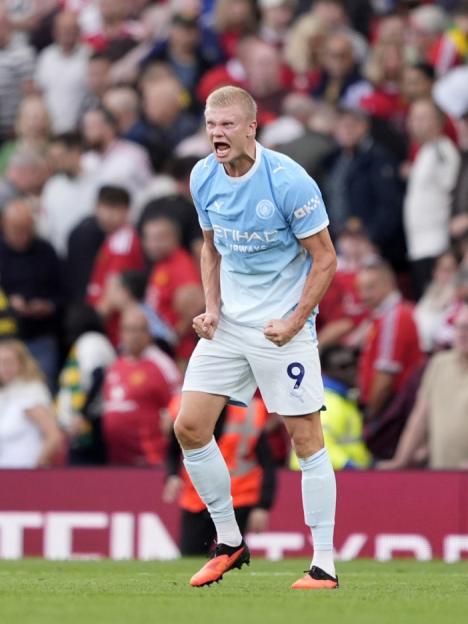 Erling Haaland of Manchester City celebrates during a match against Manchester United at Old Trafford.