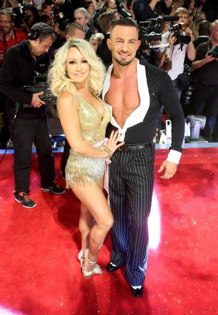 Kristina Rihanoff and Robin Windsor pose on the red carpet.