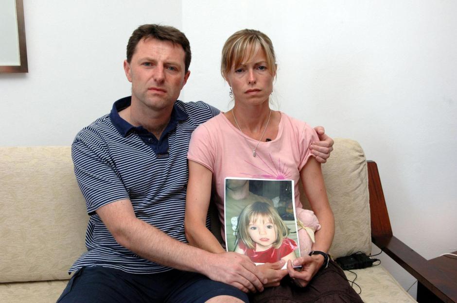 Kate and Gerry McCann appealing for their missing daughter Madeleine, holding her photo.