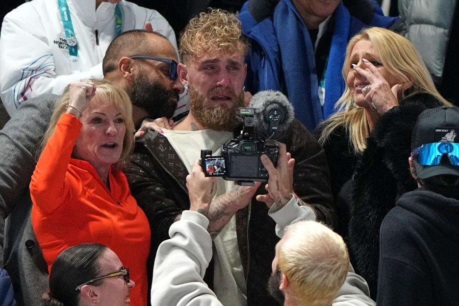 Jake Paul cries as he films his fiancé winning a gold medal at the Winter Olympics.