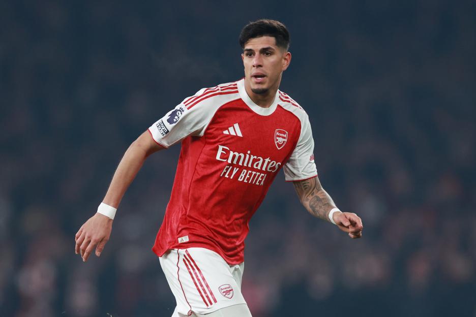 Piero Hincapie of Arsenal in a red and white jersey.