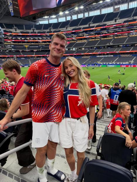 Lena Selnes and a man wearing Norwegian flag themed attire at a FIFA World Cup 2026 event.