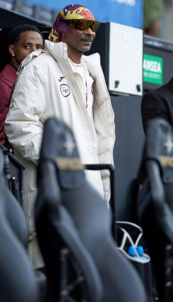 Swansea, UK. 24th Feb, 2026. Snoop Dogg, the American rapper/singer/actor & co owner of Swansea city AFC at the Swansea.com Stadium in Swansea, Wales pictured as he visits to watch a Swansea city home match for the first time as Swansea play Preston