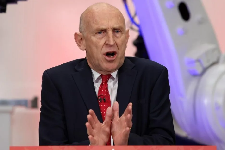John Healey, Labour's Shadow Defence Secretary, speaks during a campaign event.