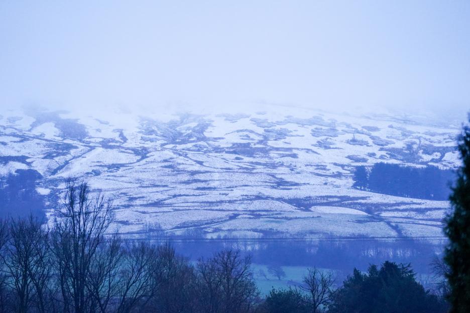 Snow-covered landscape in Bamber Booth near Edale.