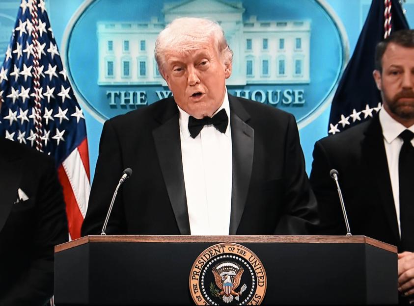 (260426) -- WASHINGTON, April 26, 2026 (Xinhua) -- This photo taken on April 26, 2026 shows a screen displaying U.S. President Donald Trump speaking at a press conference held on April 25, 2026 at the White House in Washington, DC, the United States.