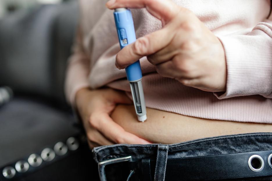 Woman Self-Injecting Semaglutide for Weight Loss Therapy at Home