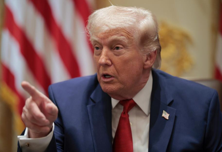 President Trump speaking and pointing during a meeting.