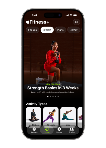 An iPhone displaying the Apple Fitness+ app with "Explore" selected, showing a "Strength Basics in 3 Weeks" program and various activity types like Meditation, Strength, and Yoga.
