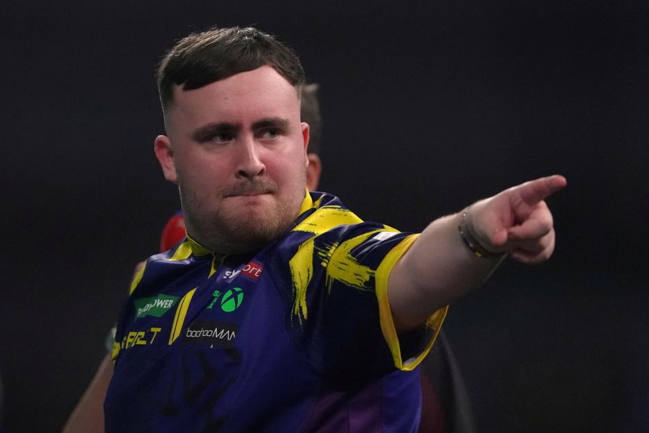 Luke Littler Bounces Back to Overcome Ryan Searle and Secure Spot in Third Consecutive World Darts Championship Final!
