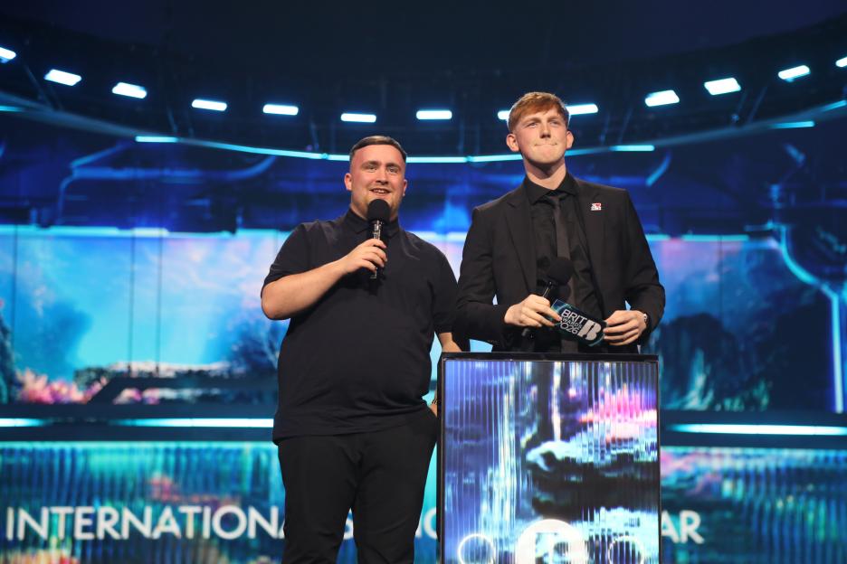 Luke Littler and Angryginge on stage during The BRIT Awards 2026.