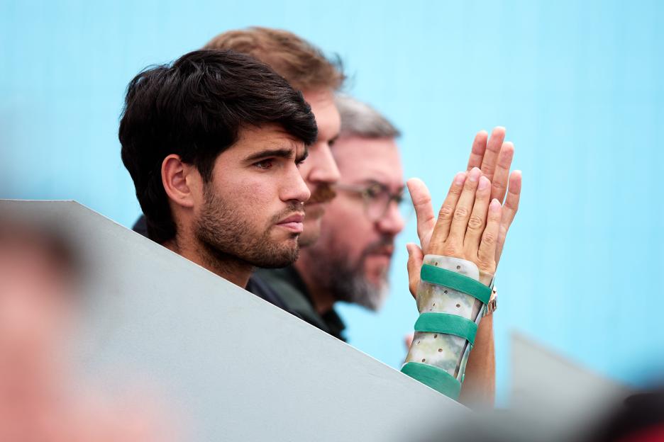 Carlos Alcaraz watching his brother Jaime Alcaraz compete from the stands.
