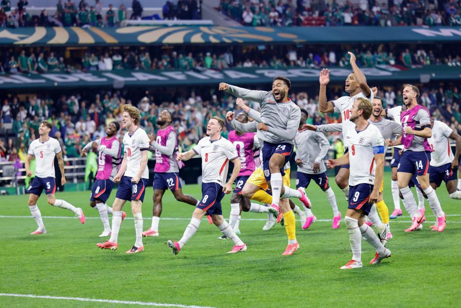 England players celebrating their victory in the 2026 World Cup round of 16 match against Mexico.