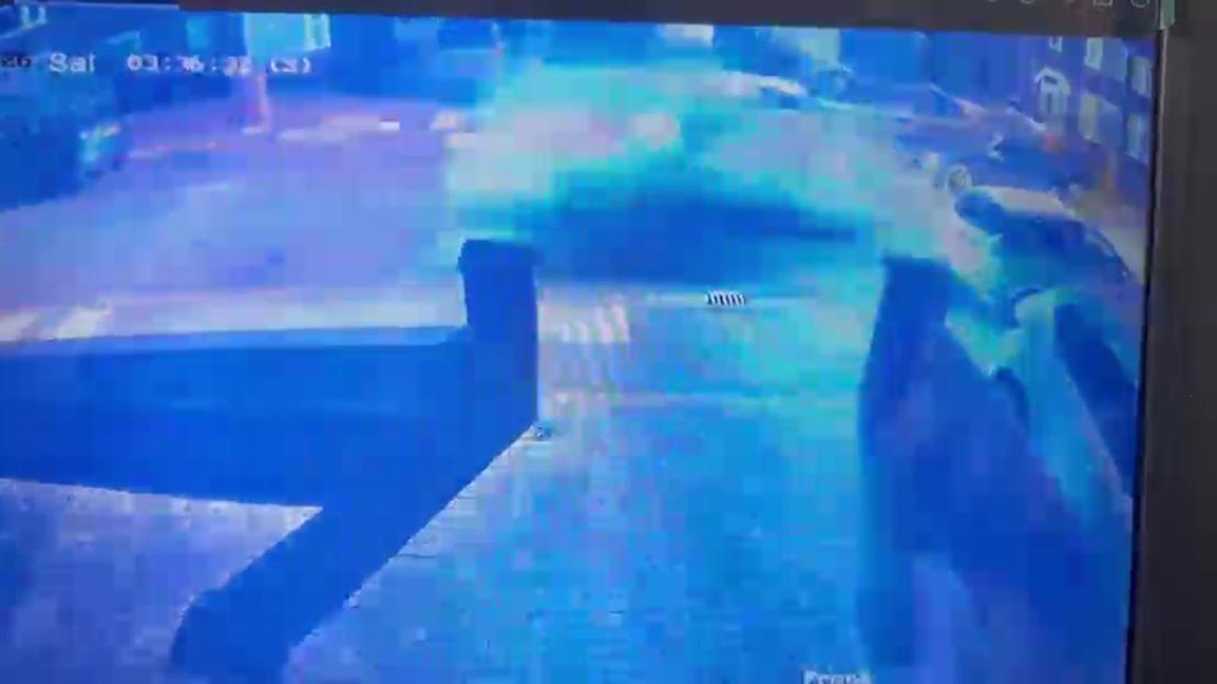 Ring doorbell footage of a car speeding down a residential street at 3:36 AM.