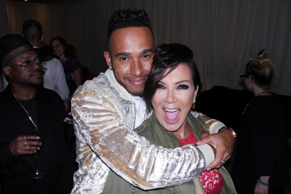 Lewis Hamilton embracing Kris Jenner.