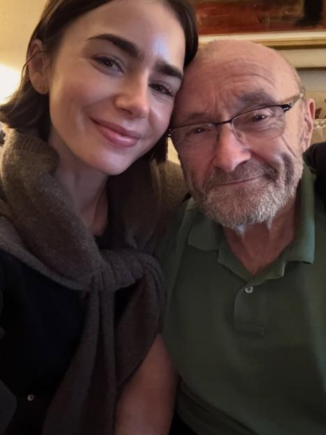 Lily Collins with her father, Phil Collins, on his 75th birthday.