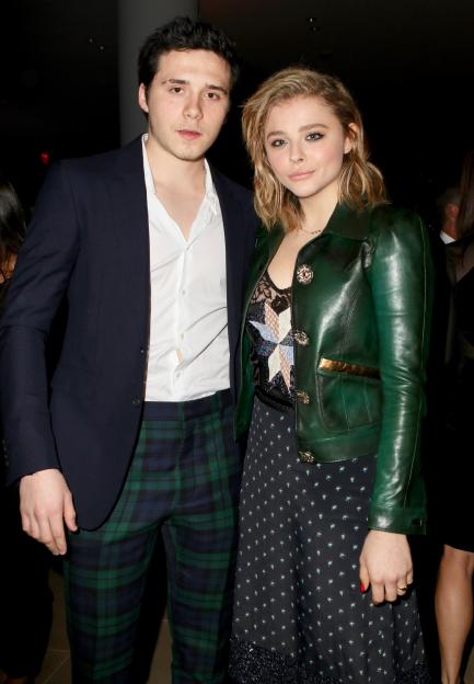Brooklyn Beckham and Chloe Grace Moretz pose together at the 31st FN Achievement Awards.