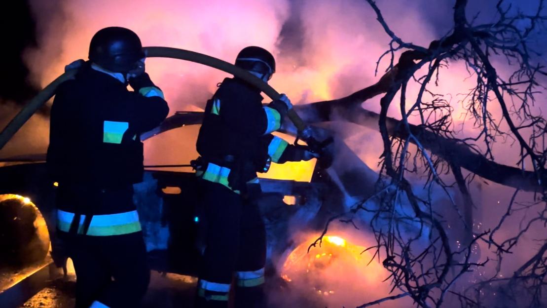 Ukrainian firefighters battling a blaze from a rocket attack in Zaporizhzhia, Ukraine.