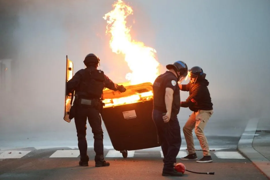 France braces for worst day of teen riots after week of school firebombings leaves 190 students injured & 5,000 arrested