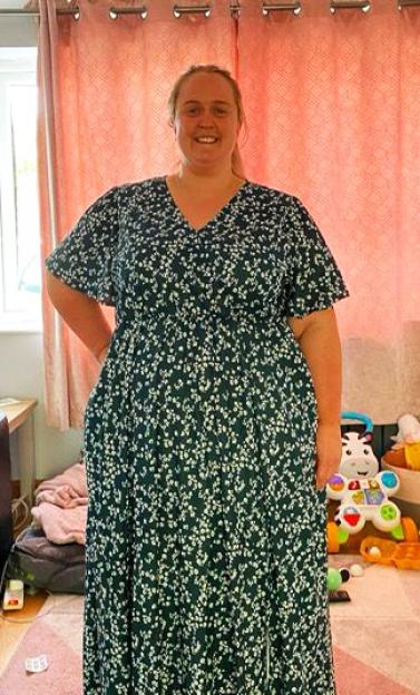 Woman in a floral maxi dress.