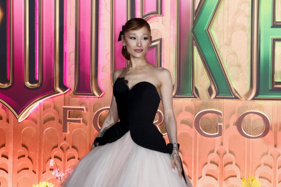 Ariana Grande in a black and white ball gown at the "Wicked: For Good" premiere.