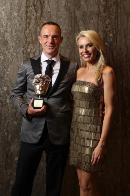 Martin Lewis and Lara Lewington backstage at the BAFTA Television Awards with the Special Award.
