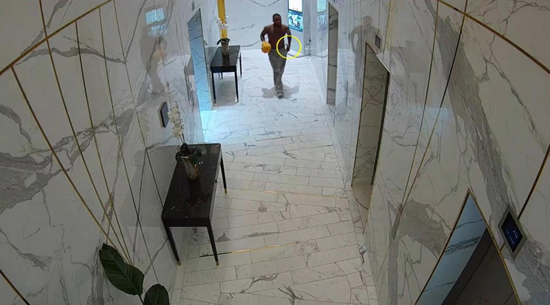 CCTV footage of Fawaz Abdul Kareem leaving his flat with a knife in his waistband.