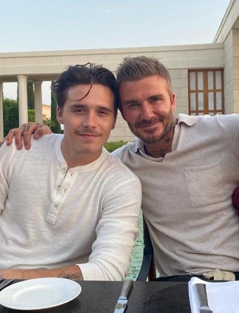 David Beckham with his sons Romeo, Brooklyn, and Cruz.